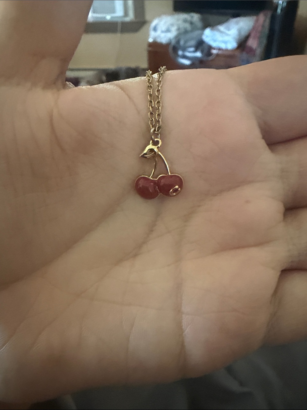 Gold chain Coach cherry necklace